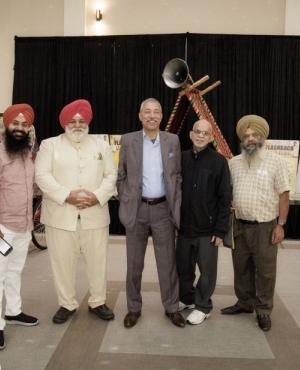 Tabla Player Amarjeet Singh, Dr. Pargat Singh Bhurji, and Kamal Sharma pose at the event 