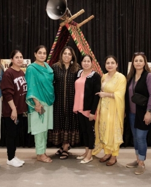 Attendees take a group photo 