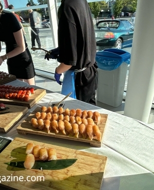 A variety of sushi being served to the public 