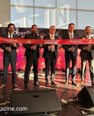 Open Road Auto Group and Honda Canada staff get ready to cut the red ribbon