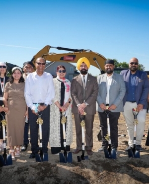 Mayor Brenda Locke and PICS staff pose with shovels 