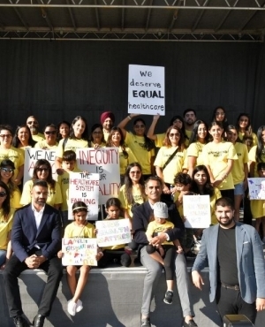 Volunteers and Dr.Randy Gill outside Surrey City Hall plaza