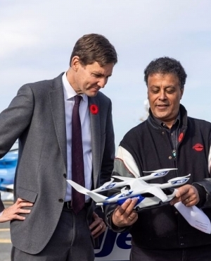 Premier David Eby takes a look at the plane model of the Helijet 