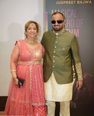 Jugpreet Bajwa poses with audience member 