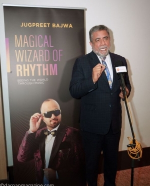 MP Sukh Dhaliwal besides Bajwa's poster 