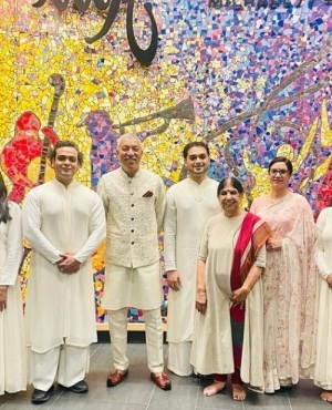 Kamal Sharma of KVP Heritage poses with the Kathak dancers 