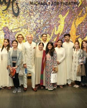 Audience members pose with Kathak performers along with Kamal Sharma 