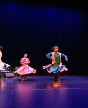 Kathak dancers chime with their ankle bells to the sounds of orchestra 