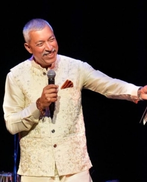 Kamal Sharma addresses the audience 