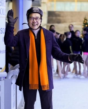 Minister Chow is all smiles at the rink 