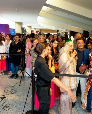 Audience waiting to get in as doors about to open 