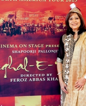 Audience member wears Mughal-E-Azam costume hat 