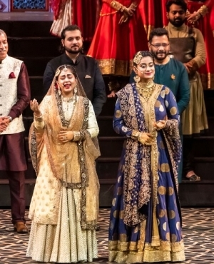 Actresses from the play captivate the audience with their singing