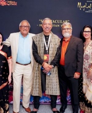 Kamal Sharma takes pics with attendees 