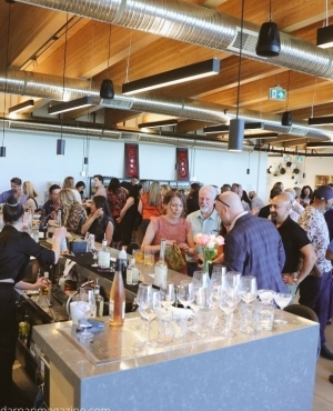 Attendees mingling at the winery 