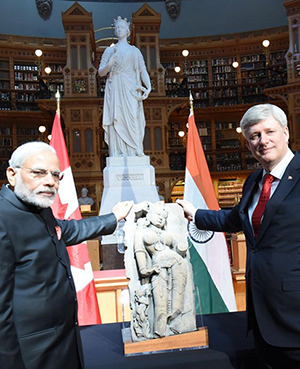 Canada returns Indian heritage piece - Parrot Lady. PM Modi receives sandstone sculpture from Khajuraho. 