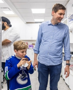 Premier David Eby's son enjoys a treat 