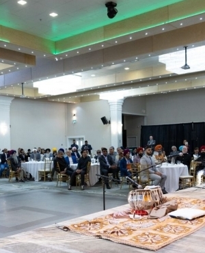 Premier David Eby addresses the audience 