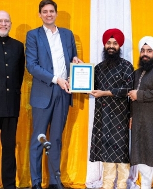 Premier David Eby with the Naad Arts Centre-Dr. Bruce Harding, Amarjeet Singh, and Baljit Singh 
