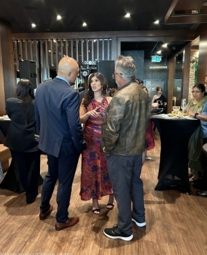 Guests mingle amongst themselves 