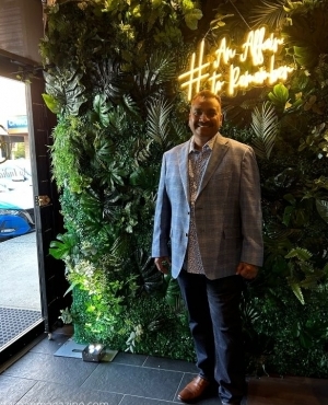 Owner of an Indian Affair Gary Bakshi is all smiles 