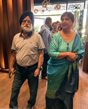 Gary welcomes guests at the door 