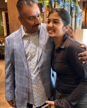 Gary greets a young attendee