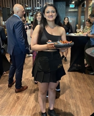 Server with delicious appetizers 