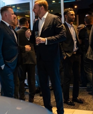 President & CEO of Rolls Royce Cars North America Martin Fritsches mingles with guests 