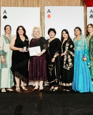 Group photo of Raj Arneja with attendees and Mayor Brenda Locke 