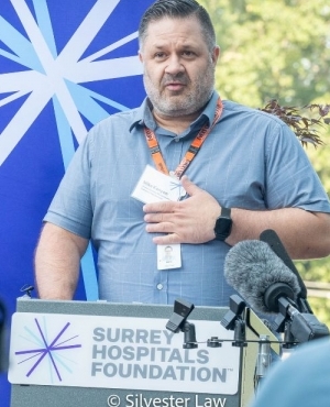 Mike Kenyon, Director of Clinical Operations, Mental Health and Substance at Fraser Health presenting to the audience