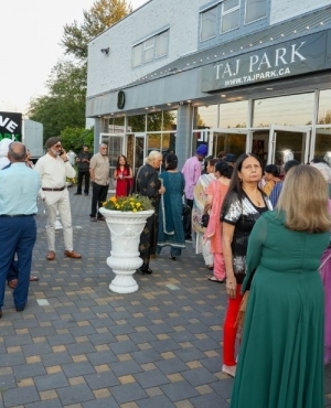 Audience gathers outside Taj Park Convention for a night of entertainment 