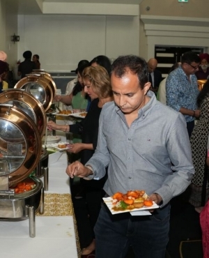 Audience enjoys appetizers at the concert 