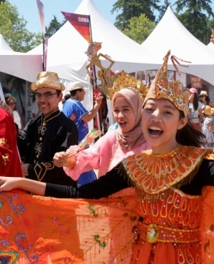 Chinese dancers perform wearing colourful outfits 