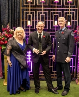 Mayor Locke presents another memento at the event 