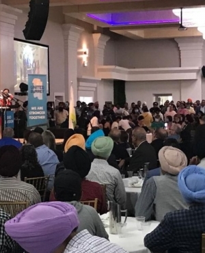 MP Sukh Dhaliwal addresses crowd at Grand Taj 