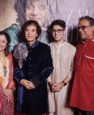 Nina Buddhev and family alongside Ustad Zakir Hussain 