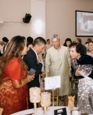 Event organizer Kamal Sharma welcomes Ustad Zakir Hussain 