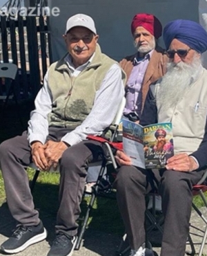 Seniors with a copy of the Vaisakhi issue of 2024 