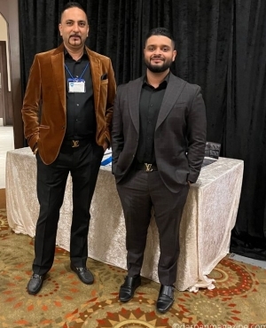 Nav Grewal Associate VP for WBI Home Warranty with client 