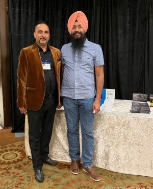 Nav Grewal Associate VP for WBI Home Warranty with client 