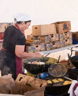  Volunteers make snacks for the attendees 