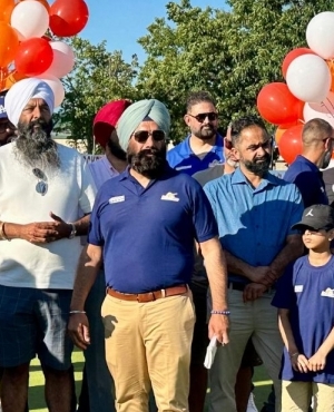 Balraj Mann of BM Group of Companies, MP Randeep Sarai, and General Secretary of West Coast Kings Field Hockey Club Udham Singh Hundal. 