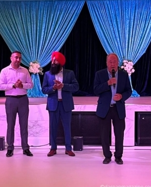 Surrey city councillor Mandeep Nagra on stage 